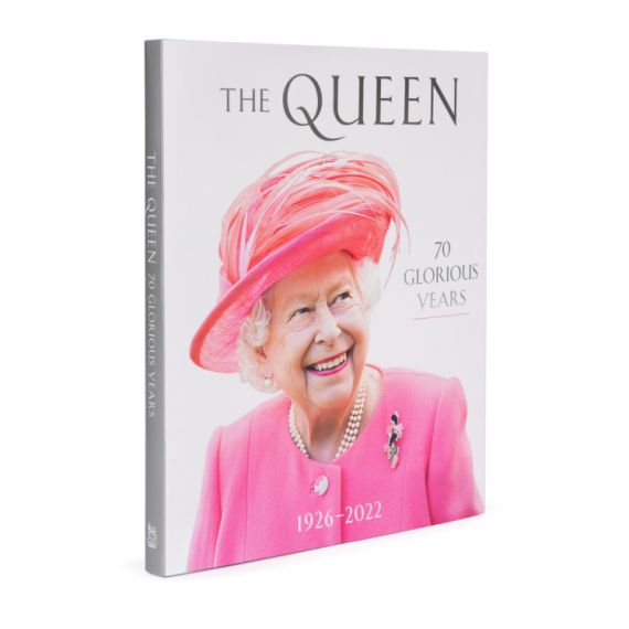 Front cover of book with a picture of Queen Elizabeth II in a pink hat and coat. 1966 - 2022 written at the bottom. Front cover of book with a picture of Queen Elizabeth II in a pink hat and coat. 1966 - 2022 written at the bottom.