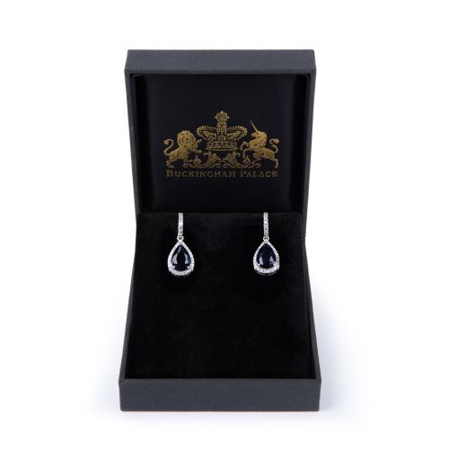 Sapphire teardrop earrings with crystal studding. 
