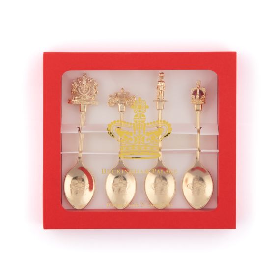 Gold Tea Spoons with various figures on the top, including royal crest, golden carriage, Gaurdsman and Crown in red packaging. Gold Tea Spoons with various figures on the top, including royal crest, golden carriage, Gaurdsman and Crown in red packaging.