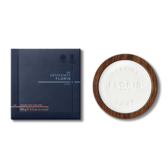 Floris No89 Gentlemans shaving soap set with wooden soap bowl with Floris printed in and blue packaging to left of product. Floris No89 Gentlemans shaving soap set with wooden soap bowl with Floris printed in and blue packaging to left of product.