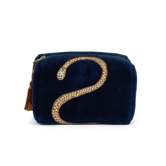 Blue velvet toiletries bag deaturing gem studded snake design. Blue velvet toiletries bag deaturing gem studded snake design.